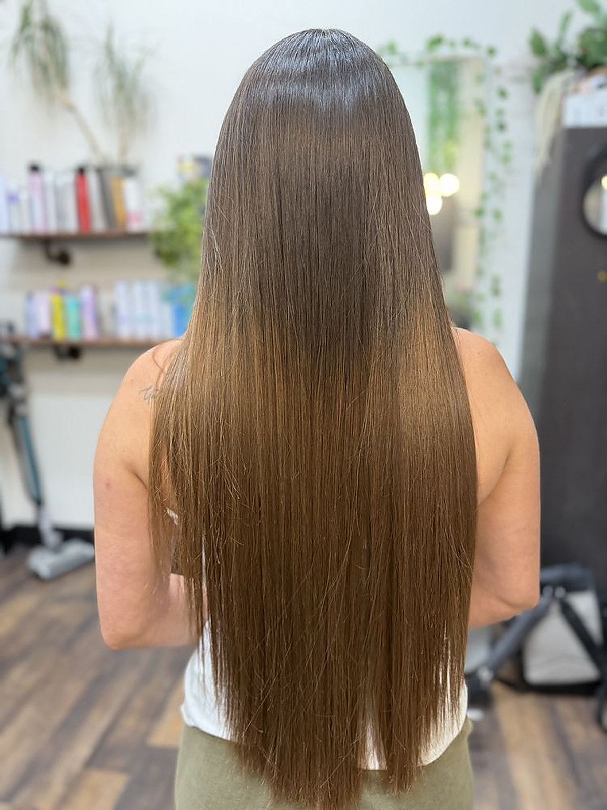 Waist-length brunette finished straight